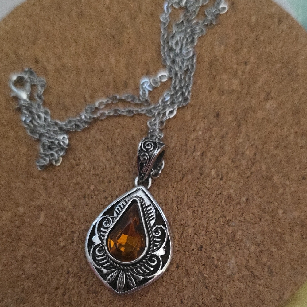 Elegant Silver Necklace with Amber Pendant